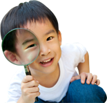 kid looking through magnifying glass
