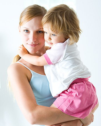 Mom holding her daughter