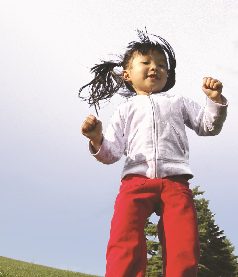 toddler jumping outside