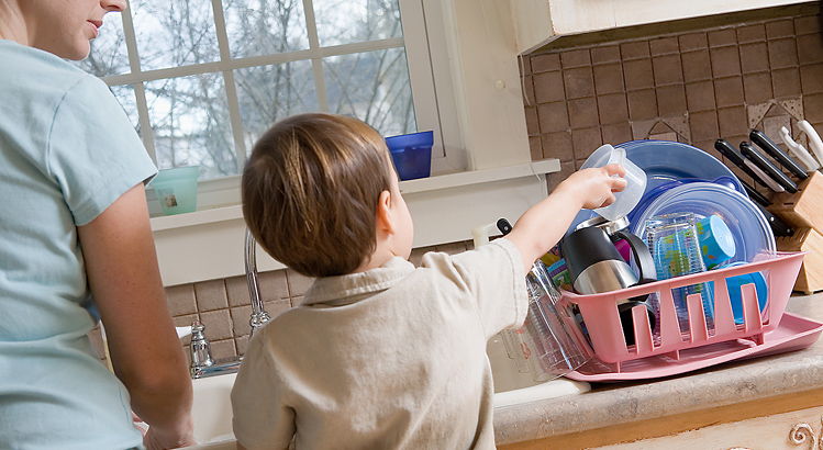 boy washing dishes