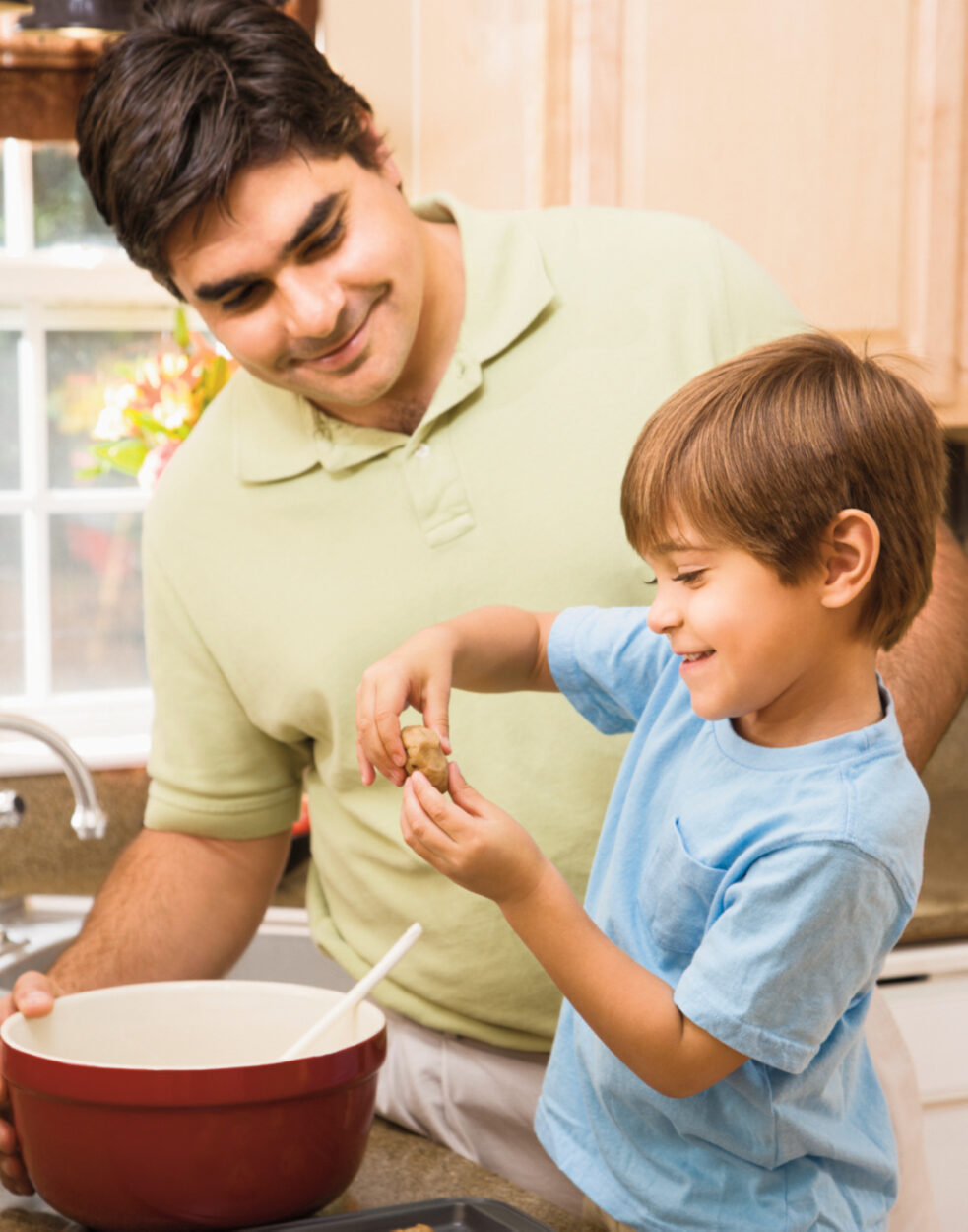 Dad baking with his son