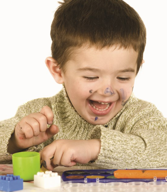 Messy boy playing