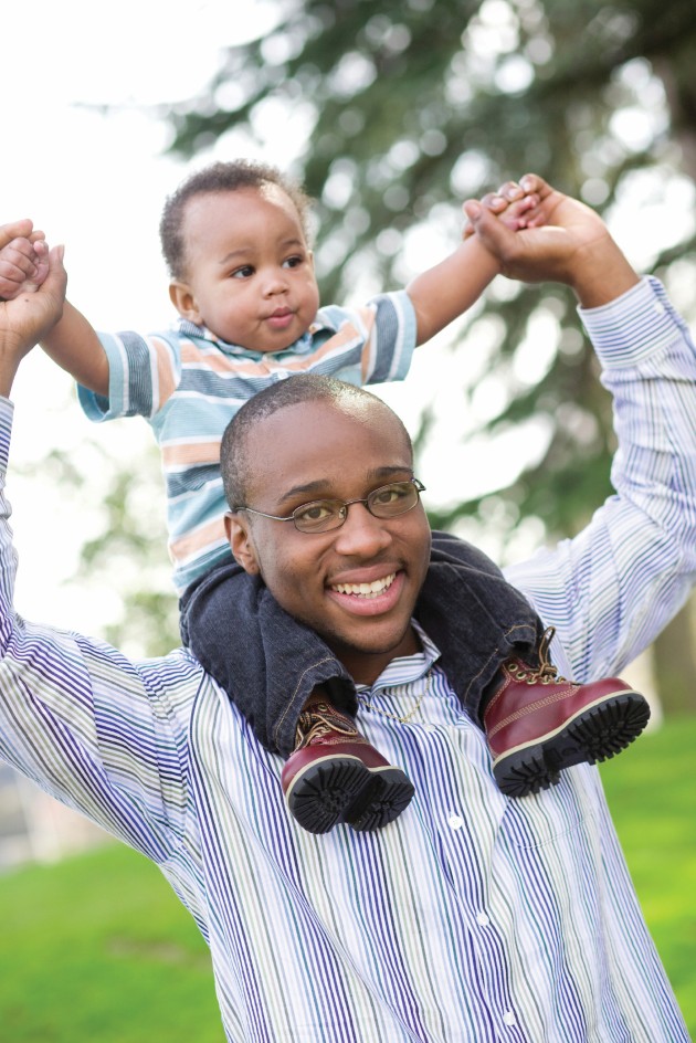Baby on his father's shoulders