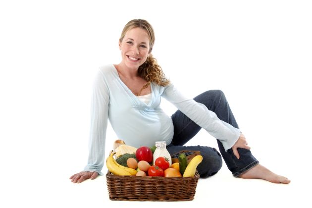 Mom sitting with healthy foods